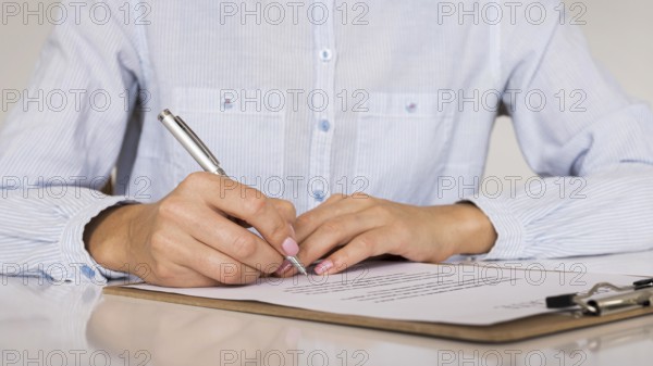 Person signing contract certificate