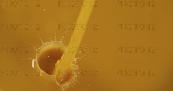 Orange Juice being poured