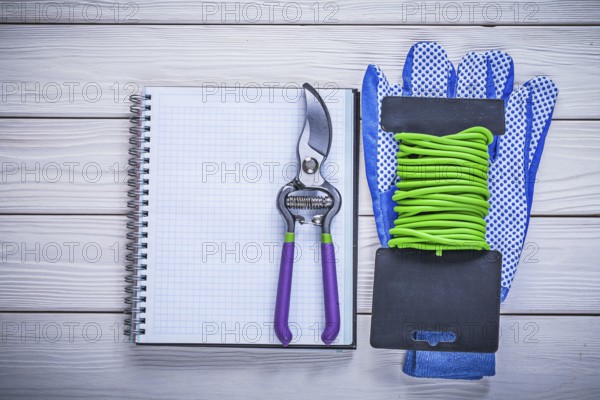 Garden tie wire protective gloves copybook scissors gardening concept