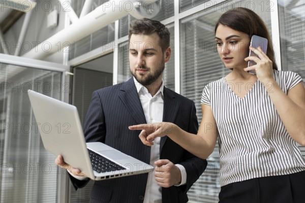 Colleagues planning business project together