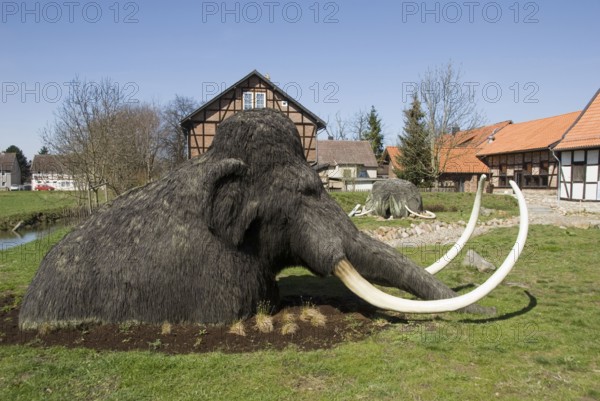 Mammoth statue, extinct, Ice Age Garden, Salder Castle Municipal Museum, Salder, Salzgitter, Lower Saxony, Germany, Europe