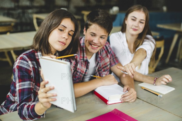 Cheerful students playing classroom