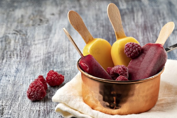 Fruit popsicles ice cream on a plate