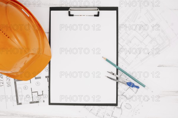 Architecture concept with clipboard helmet. Resolution and high quality beautiful photo