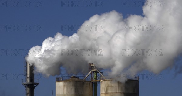 Smokestack of Sugar Refinery with Water Vapour, Near Caen in Normandy