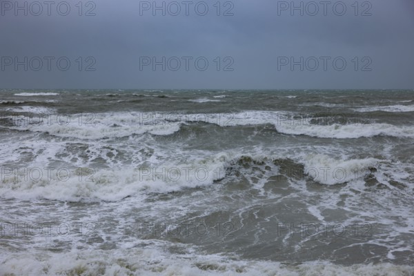 Stormy sea, foaming sea in storm with high waves on the English Channel, Portbail, Cotentin, Manche, Normandy, France, Europe