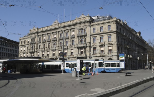Zurich's Paradeplatz in the financial centre in times of Corona Virus log down with no crowds and very vew people