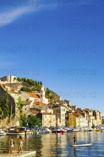 Croatia, 21 07 2014: Old town streets in town Sibenik with marble and stone buildings in background. Tourist place to visit, Europe