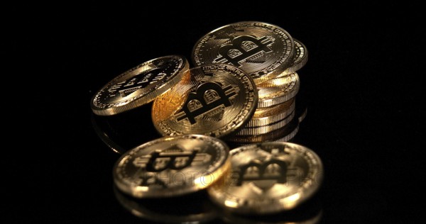 Bitcoins on Black Background