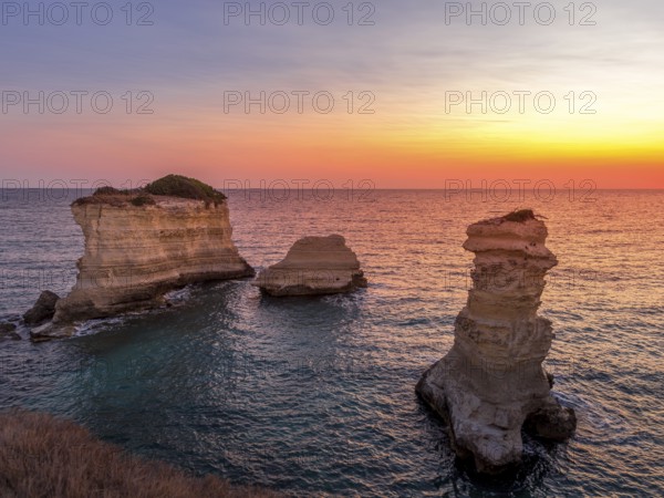 Meledugno town in Italy, Puglia Region. Spectacular view at sunrise on Santo Andrea cliffs