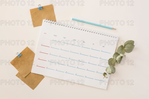Top view desk calendar leaves