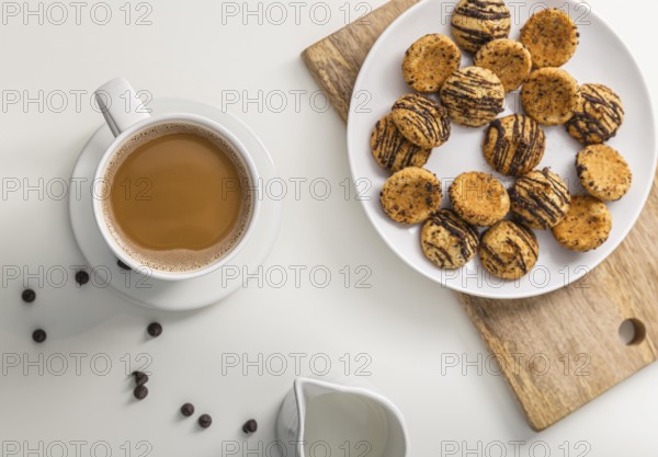 Top view coffee cup with plate cookies