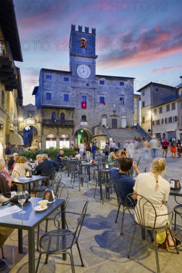 Cortona Arezzo Tuscany Italy. Palazzo del Popolo in Piazza della Repubblica at sunset