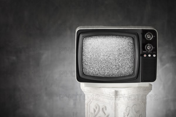 Old portable television with static noise