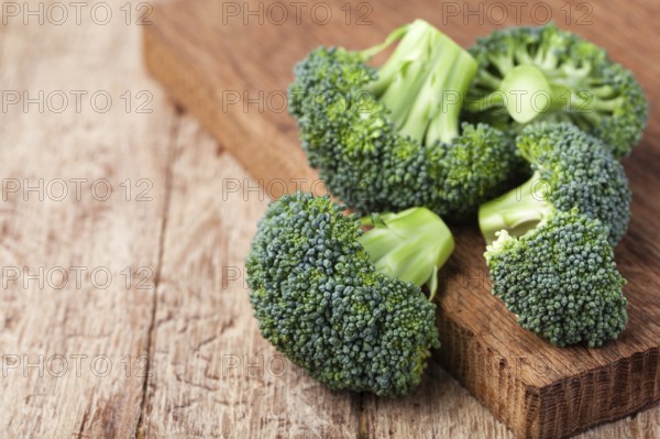 fresh broccoli on a wooden table