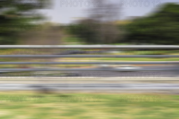 Panning. Motion blurred background. Speed concept