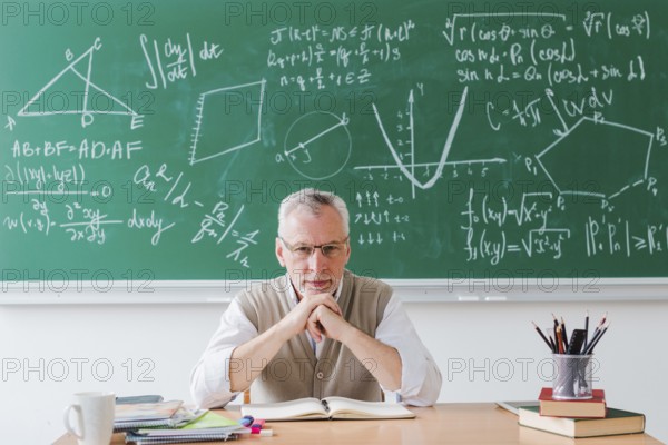 Strict teacher looking camera classroom