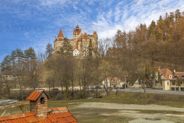Beautiful panoramic view of Dracula Bran medieval castle and blue cloudy sky, Transylvania, Romania, Europe