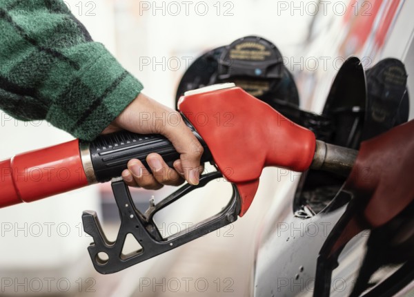 Man gas station with car close up