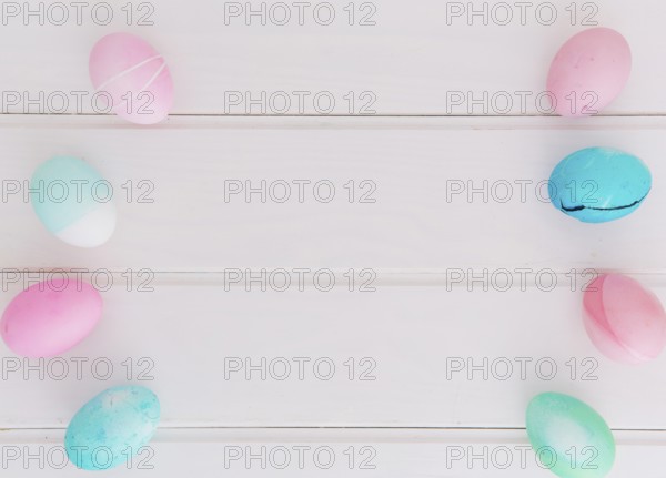 Rows bright easter eggs desk