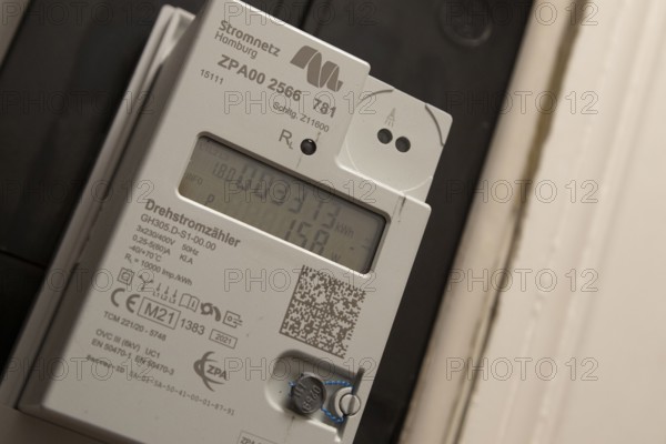 Symbolic image of energy costs in the household, digital electricity meter in a flat, operator Stromnetz Hamburg, Hamburg, Germany, Europe
