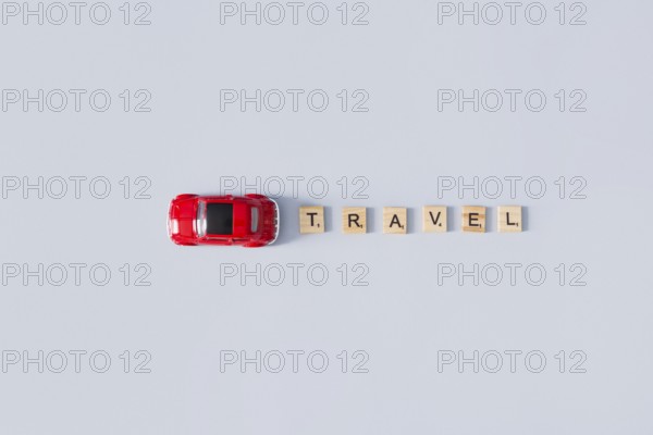 Travel letters toy car. High resolution photo