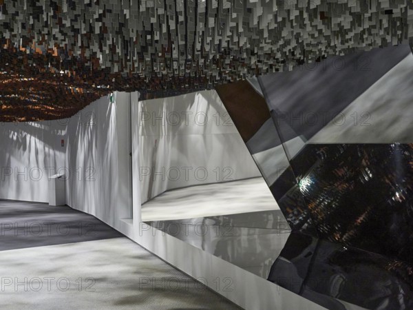 Futuristic interior with geometric shapes and reflective, metallic surfaces, interior design Philharmonie de Paris. Paris