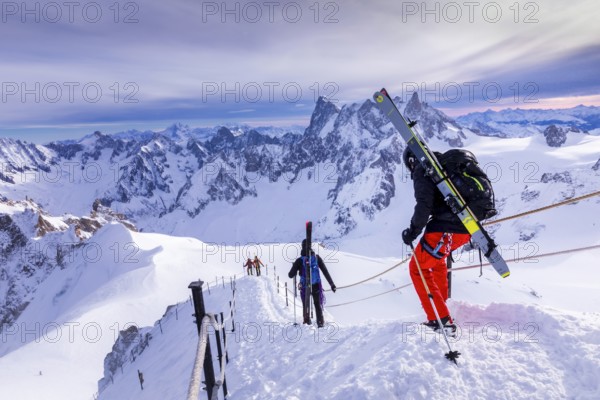 Off piste skiers on their way dowm from Aiguille du Midi, Chamonix, France, Europe