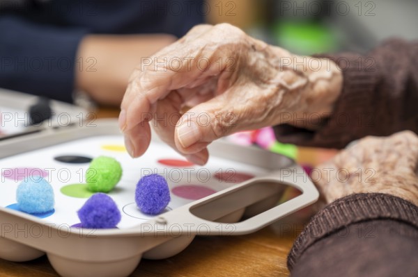 Rehabilitation center. Brain therapy cognitive psychological testing on senior patient. Alzheimer's disease and dementia prevention concept. Adaptation skills recovery. High quality photo
