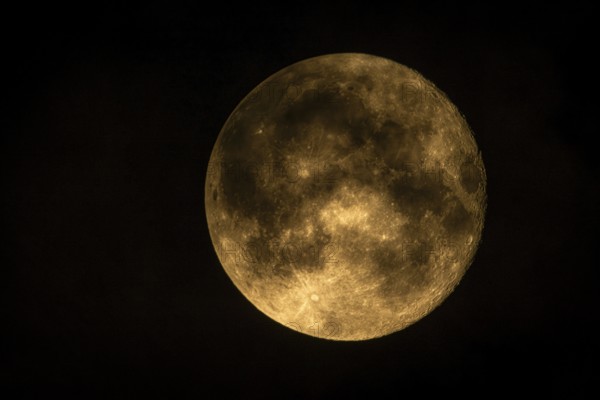 Super moon one day after full moon, moon behind clouds, Braunschweig, Lower Saxony, Germany, Europe