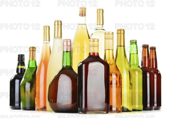 Bottles of assorted alcoholic beverages isolated on white background