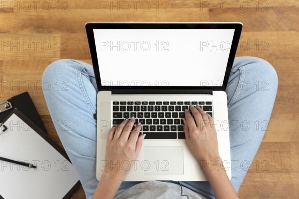 Top view woman working home during quarantine with laptop