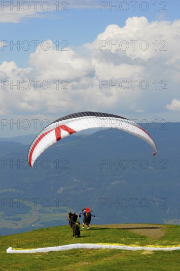 Schlern area in South Tyrol, Alpe di Siusi, paragliders at take-off