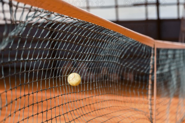 Tennis net with ball