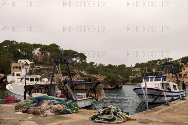 Fishing boats and fishing nets in the harbour of Cala Figuera near Santanyí, Majorca, Balearic Islands, Spain, Europe