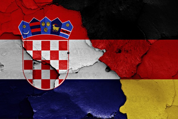 Flags of Croatia and Germany painted on cracked wall