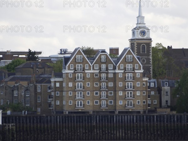 Shore with buildings and a tower, Tilbury, England, Great Britain