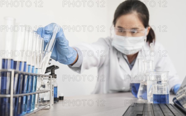 Woman working with chemical substances