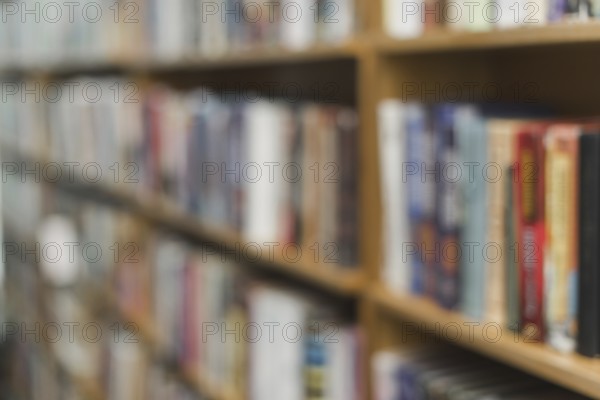 Blurred books library shelves