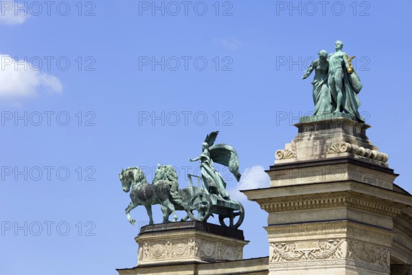 Millennium Monument on the Heroes Square in Budapest, Hungary with statues symbolizing Peace, Knowledge and Glory (top of right colonnade)