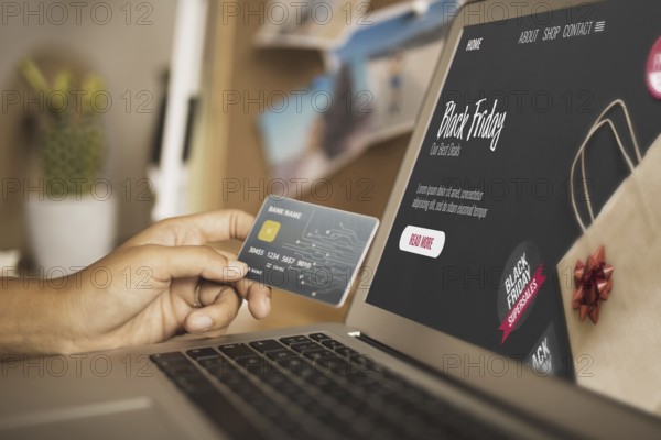 hand holding card laptop mock up