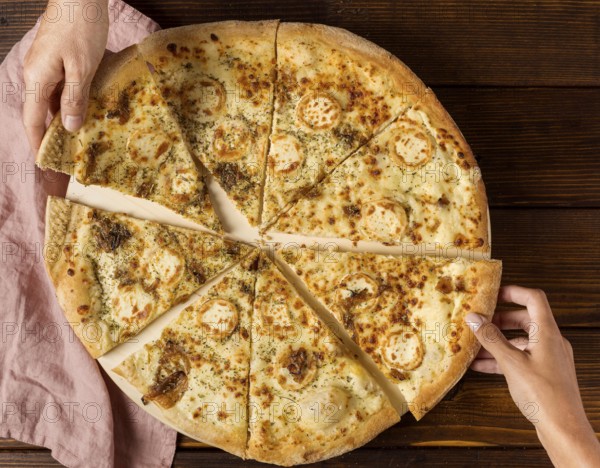 Top view hands taking slices pizza with cheese