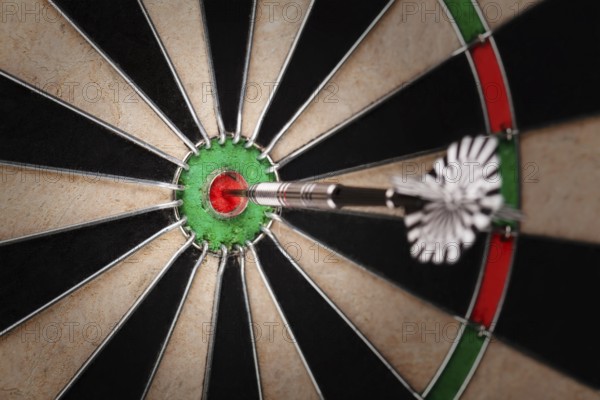 darts arrows in the target