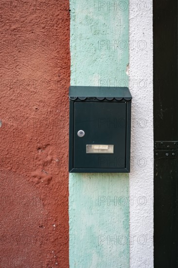 Letterbox on a red-blue-white house wall, colourful houses on the island of Burano, Venice, Veneto, Italy, Europe