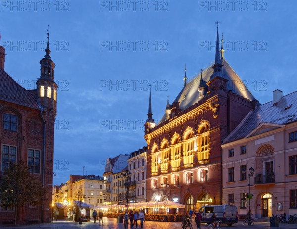 The Areszt sledczy in the medieval old town of Thorn, illuminated in the evening. The historic city centre of Torun is a UNESCO World Heritage Site. Torun, Kujawsko-Pomorskie, Poland, Europe