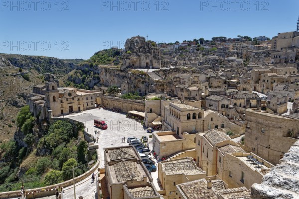 The rock church of Santa Maria dell'Idris towers over the Sasso Caveoso district in the cave town of Matera. The cave settlements, Sassi, are a UNESCO World Heritage Site. Matera, Basilicata, Southern Italy, Southern Europe