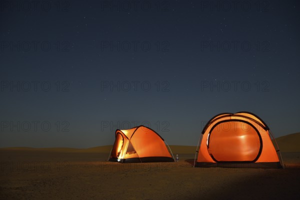 Tents in the Nubian Desert in the evening light, near Dongola, Northern State, Nubia, Sudan, Africa