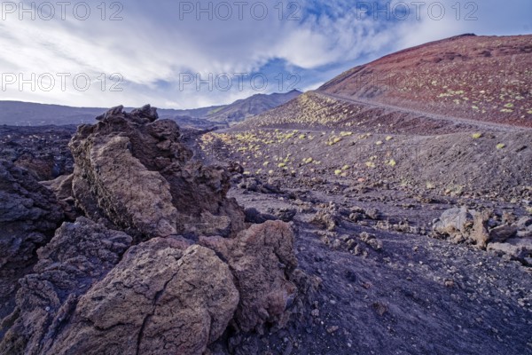 Lava rock and crater landscape around the Crateri Silvestri in the Etna National Park, Parco dell'Etna. The Etna volcano is a UNESCO World Heritage Site. Nicolosi, Sicily, Italy, Southern Europe, Europe
