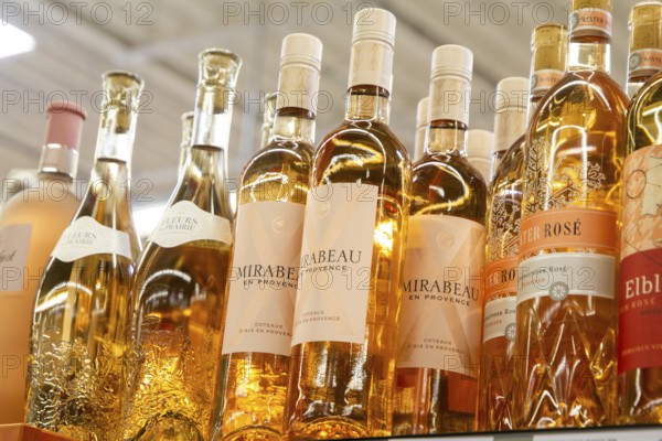 February 2024: Wine shelf with wine from France in the supermarket