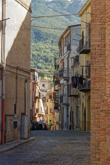 Cobblestone street in the historic centre of the Sicilian town of Castelbuono. Sicily, Italy, Southern Europe, Europe